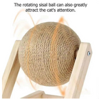 Rotating sisal ball on a wooden stand with text about attracting a cat's attention.